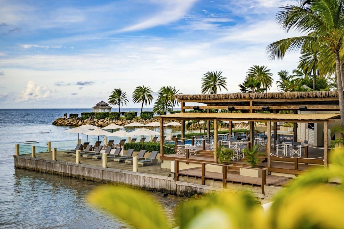 Overwater jetty restaurant at the resort at Caribbean Wonder