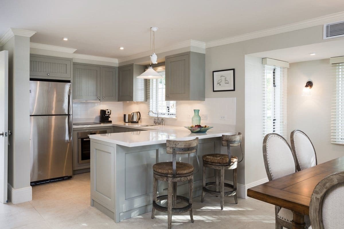 Grey shaker kitchen with island and breakfast stools at Caribbean Wonder