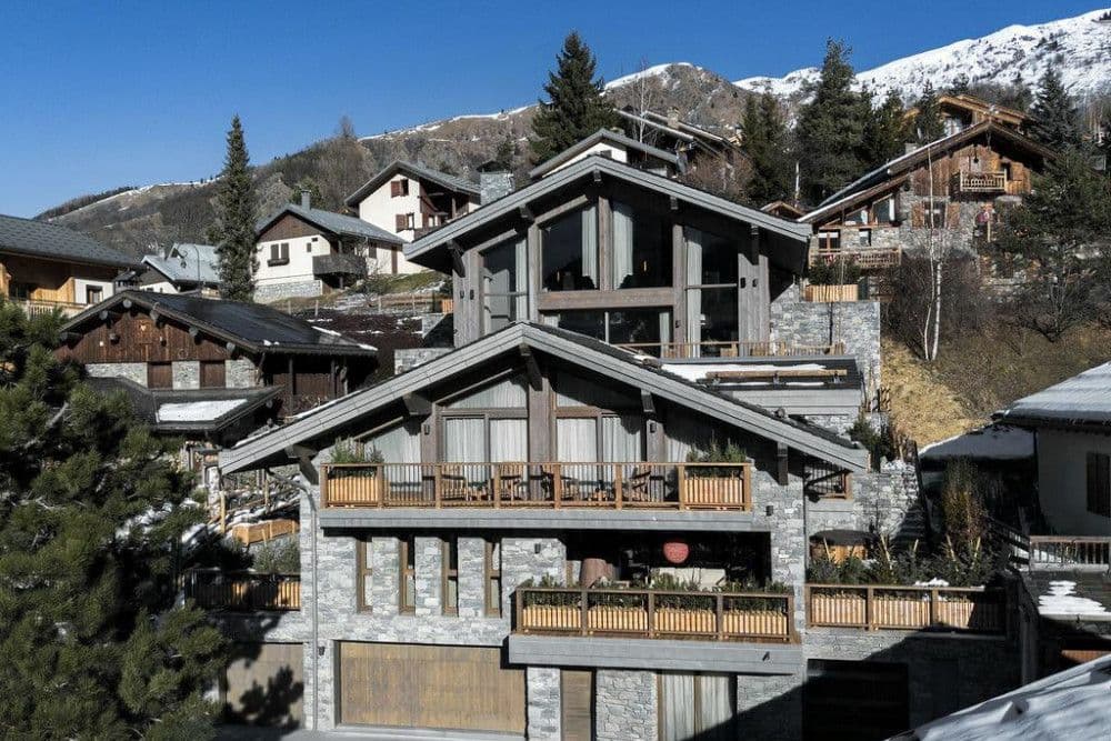 Stone and timber chalet in the snow at Saint-Martin-de-Belleville