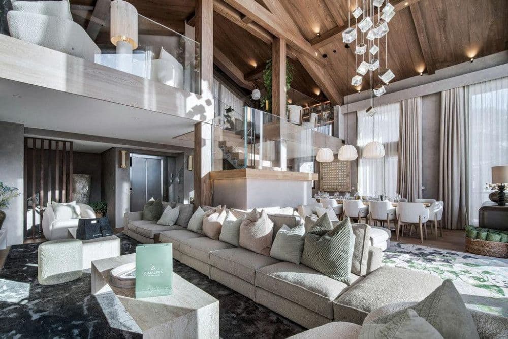 Double-height living room with a mezzanine and mountain glass at Saint Martin de Belleville 12