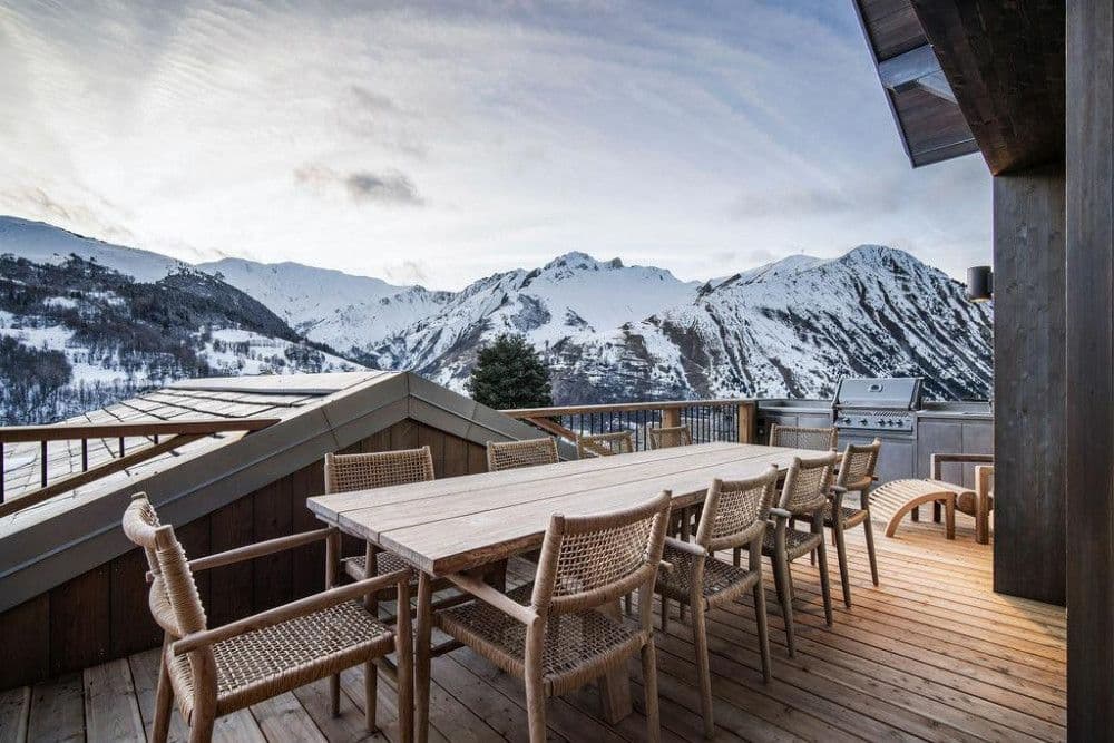 Terrace dining with a barbecue and mountain panorama at Saint Martin de Belleville 12