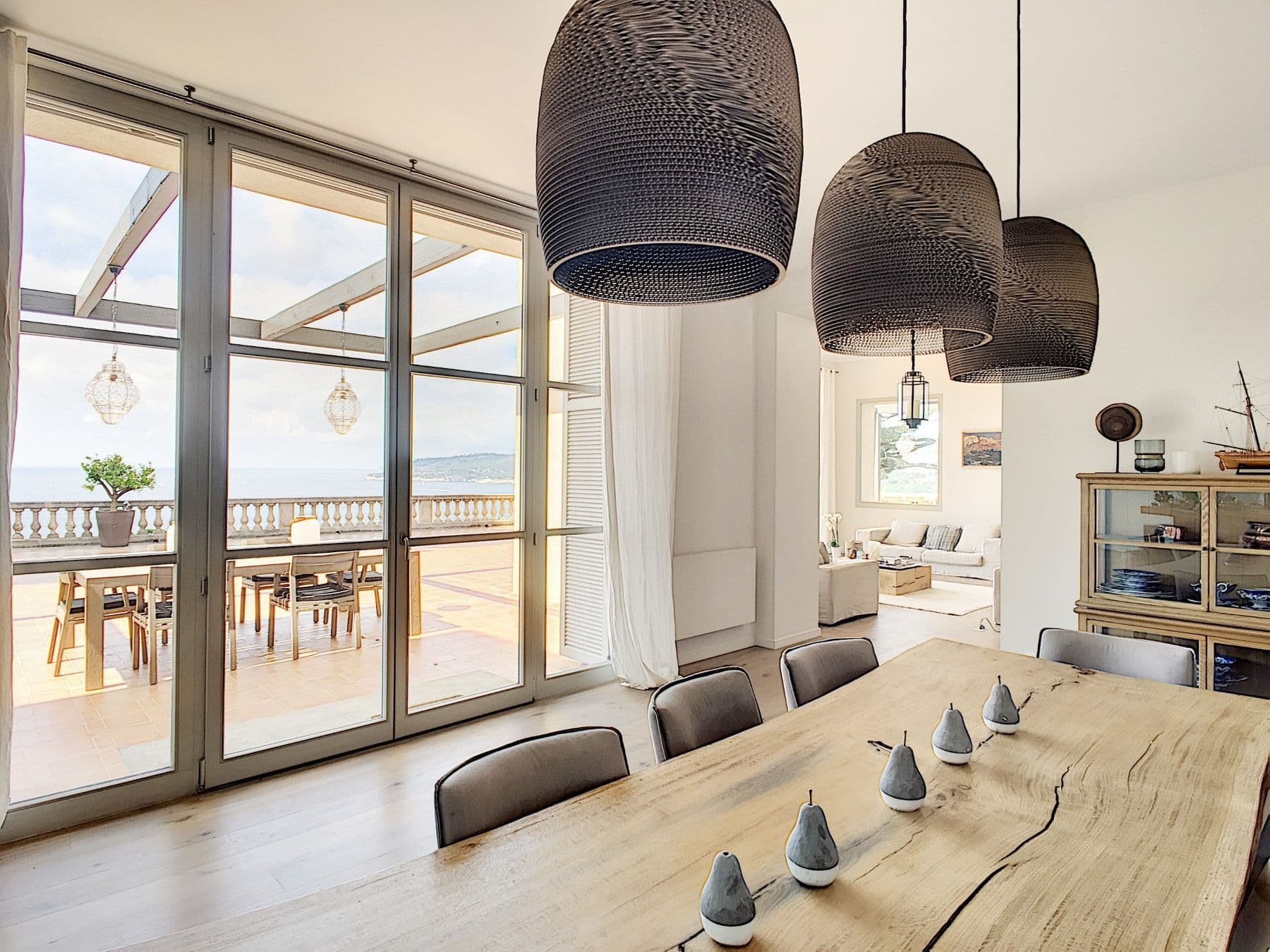 Home cinema with red velvet seating and black walls at Be Our Guest, Cassis, France