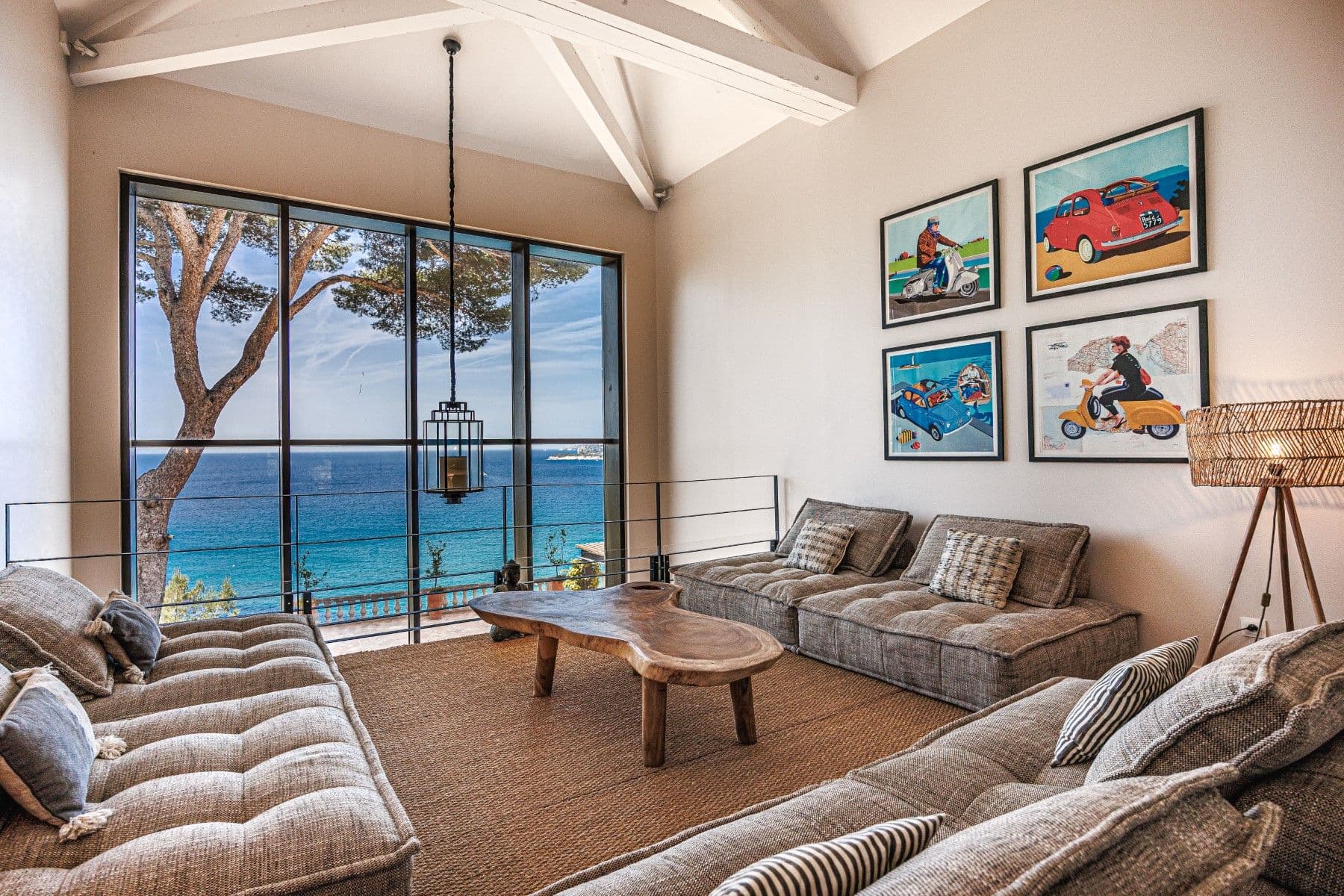 Sitting room with a grand piano and sea-view windows at Be Our Guest, Cassis, France