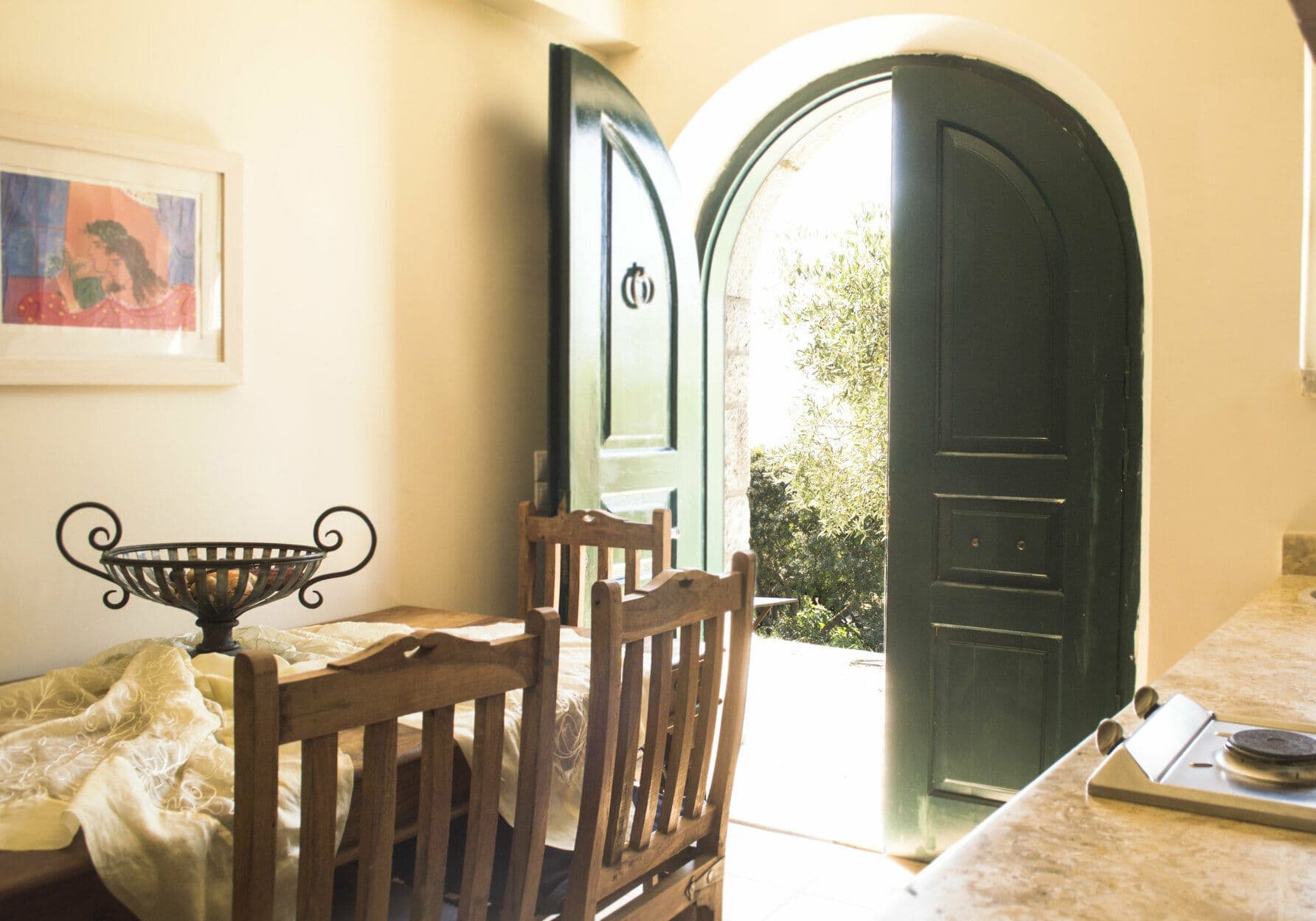 Bedroom with twin doors opening directly onto the garden terrace