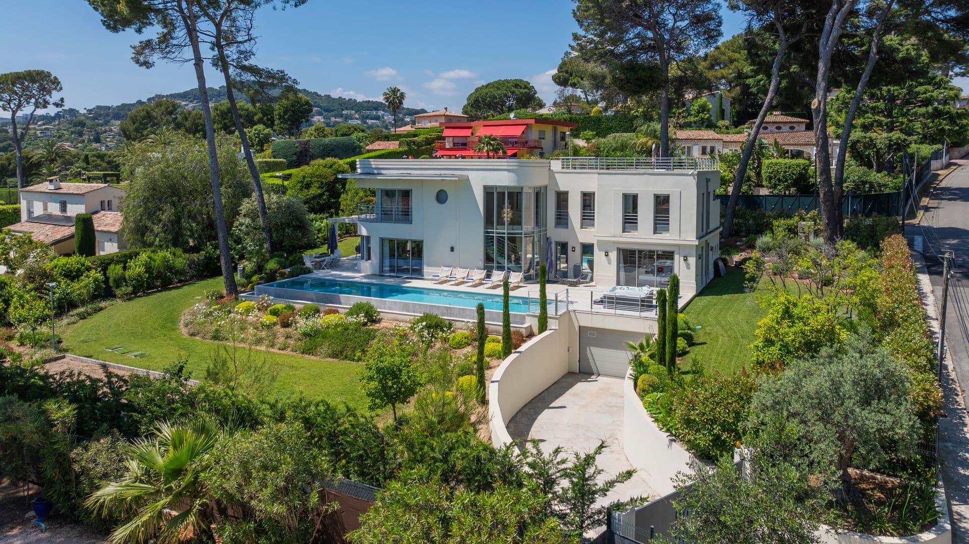 Aerial view of Above Antibes showing the villa, pool and landscaped garden on Cap d'Antibes