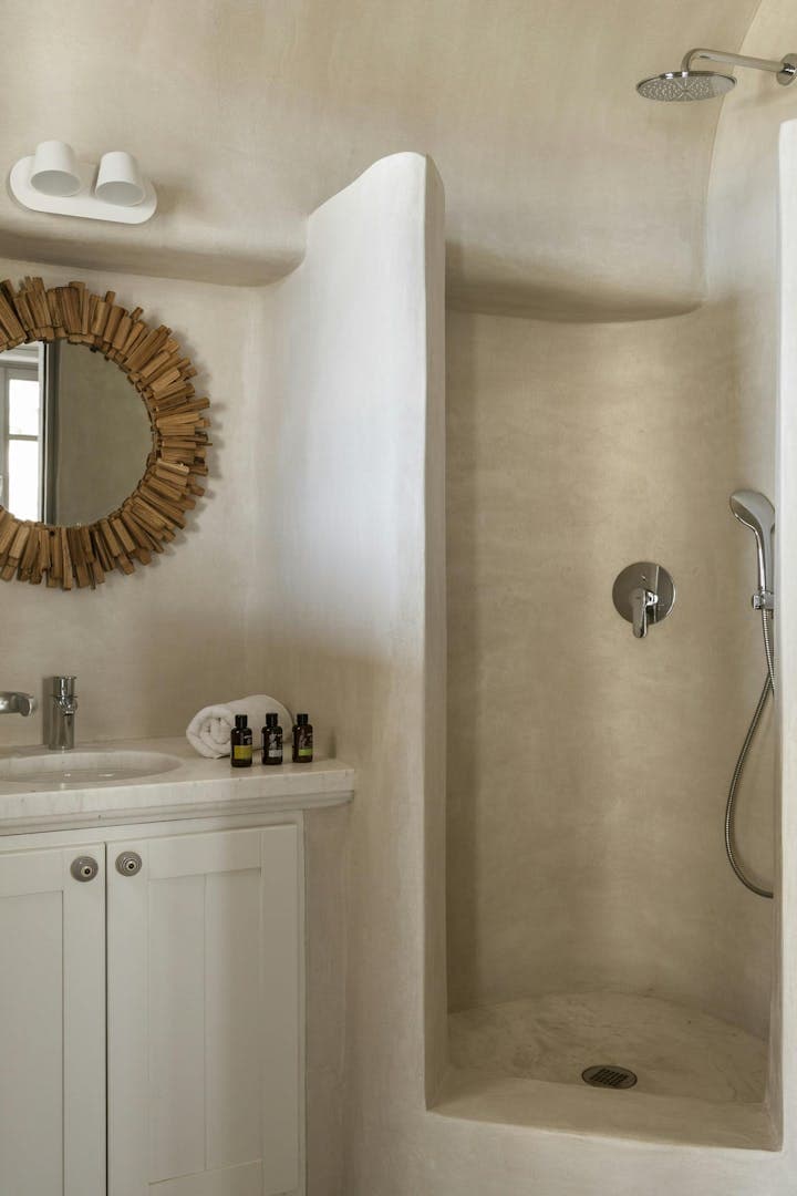 Oasis Dawn ensuite bathroom with curved shower, Kalafati, Cyclades Islands, Greece