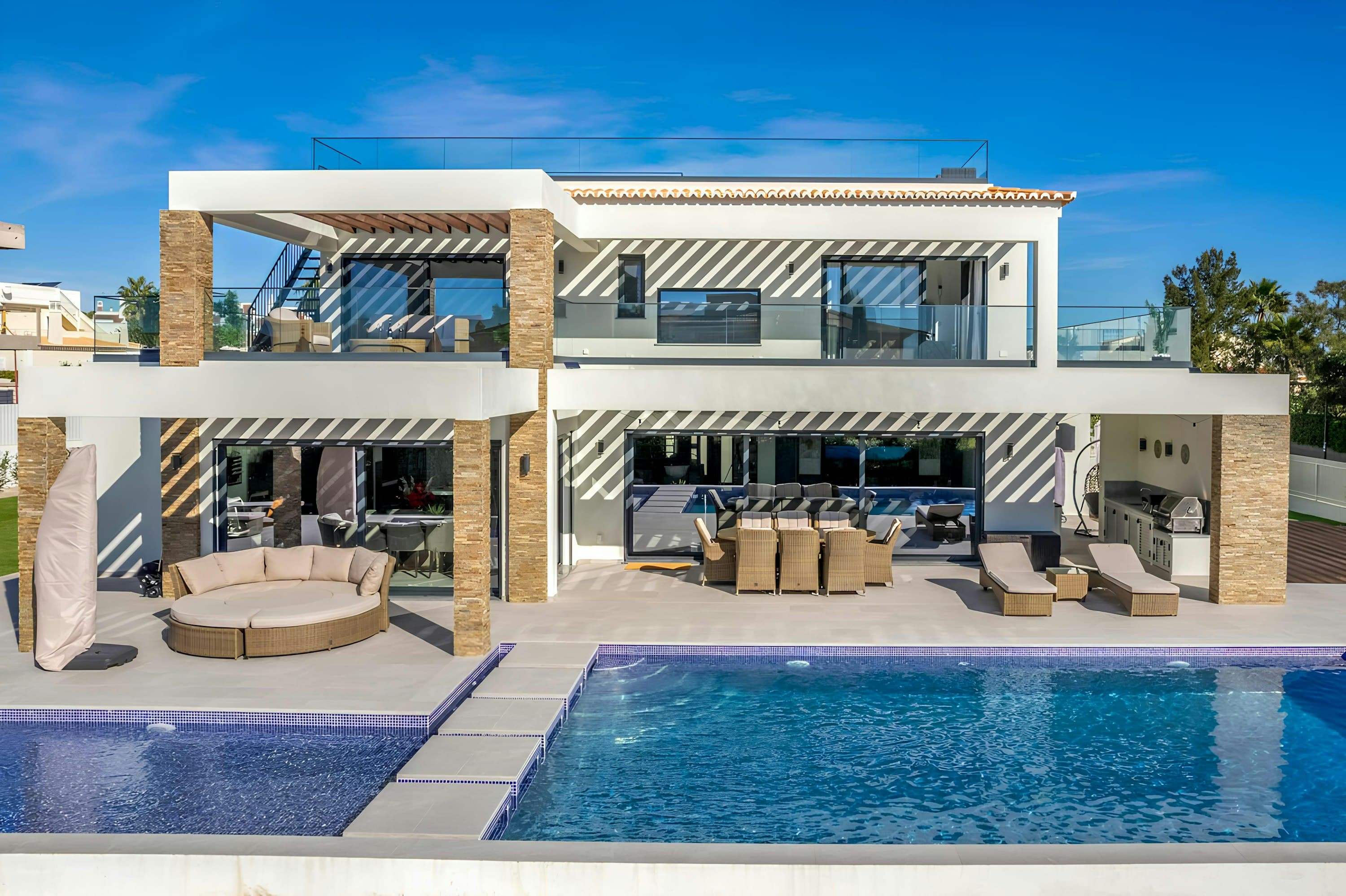 Carvoeiro Retreat villa with infinity pool and terraced facade, Carvoeiro, Algarve, Portugal