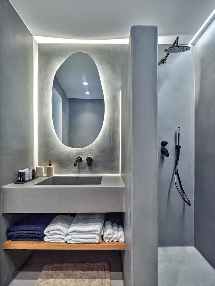 Paros Bliss ensuite bathroom with concrete walls, Paros, Cyclades Islands, Greece