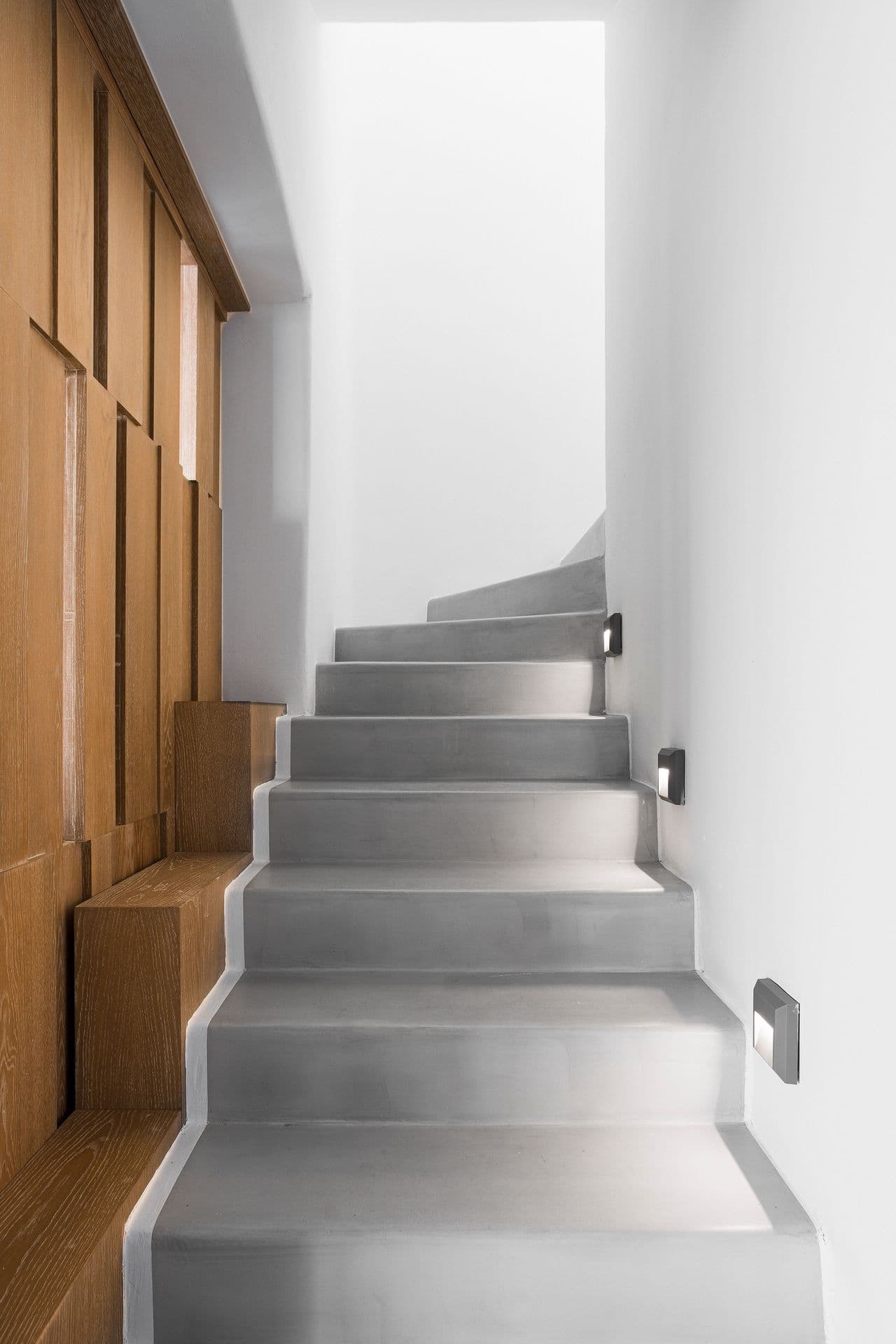A staircase at Goddess of the Clouds leads to the upper floor.