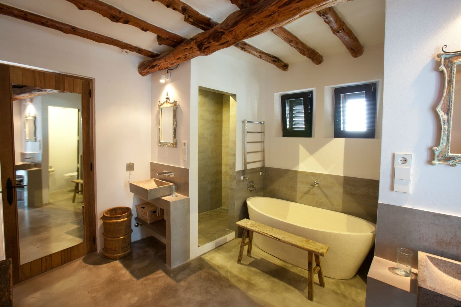 Beamed en-suite with a freestanding tub and walk-in shower at Cicadas Sway, Ibiza