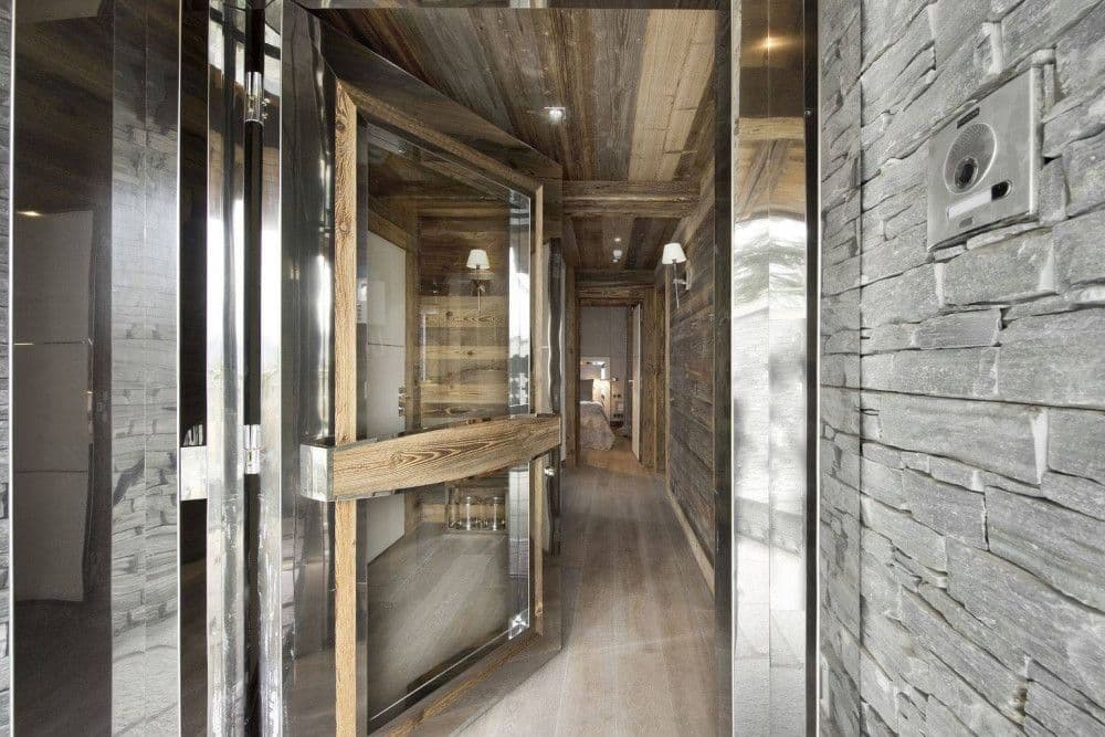 Lift and timber-lined landing at Courchevel 26