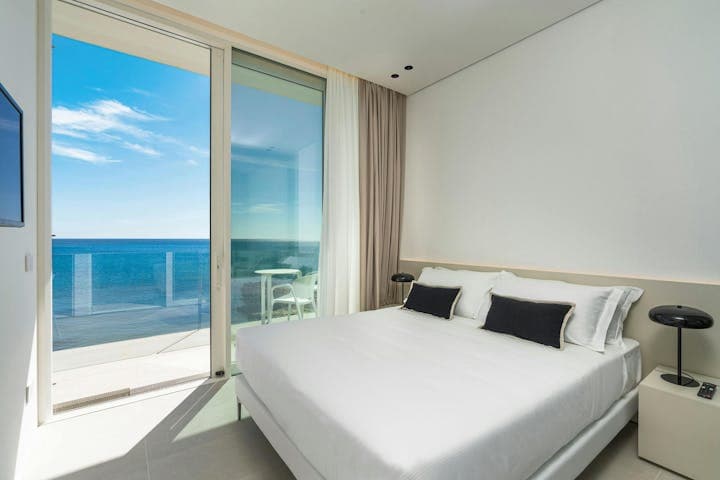 A Splash of Tangerine master bedroom with sea view terrace, Marina di Noto, Sicily, Italy