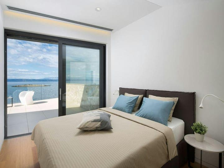 Secluded Shores master bedroom with waterfront terrace, Blato, Dalmatian Coast, Croatia
