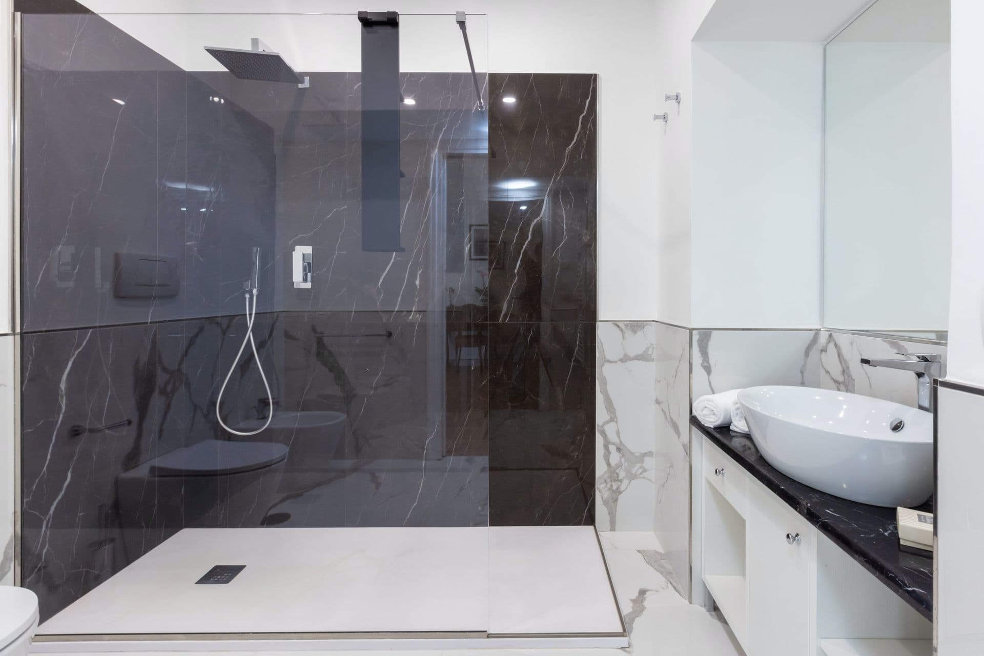 Marble vanity and sink in an en-suite bathroom at Pavillion Paradiso