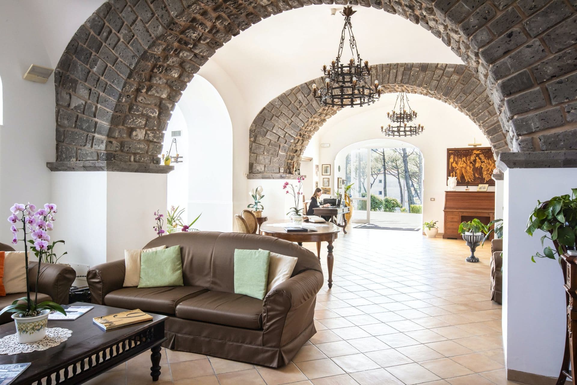 Grand stone archway gallery hall at Pavillion Paradiso villa