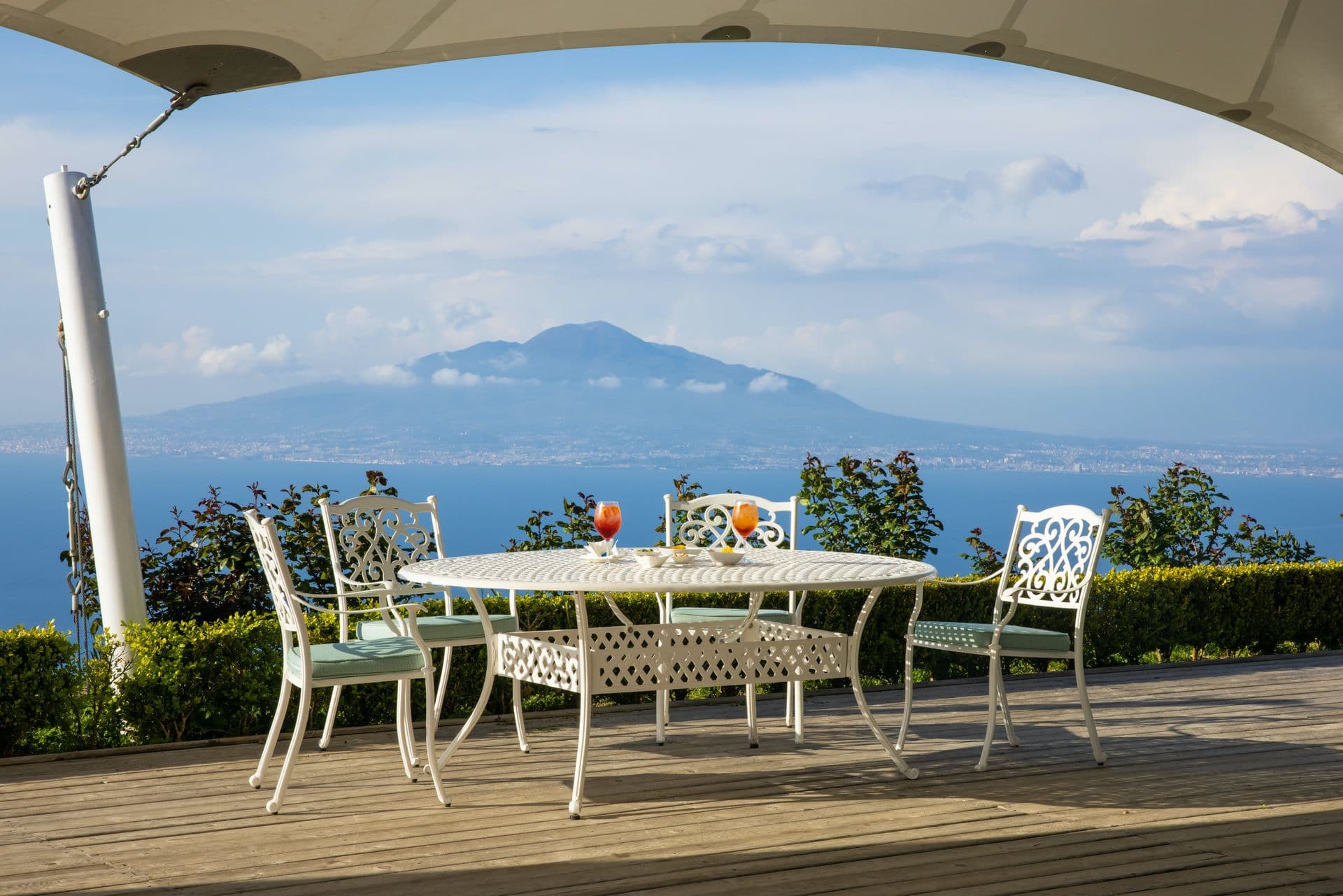 Terrace dining table overlooking the Bay of Naples and Mount Vesuvius at Pavillion Paradiso