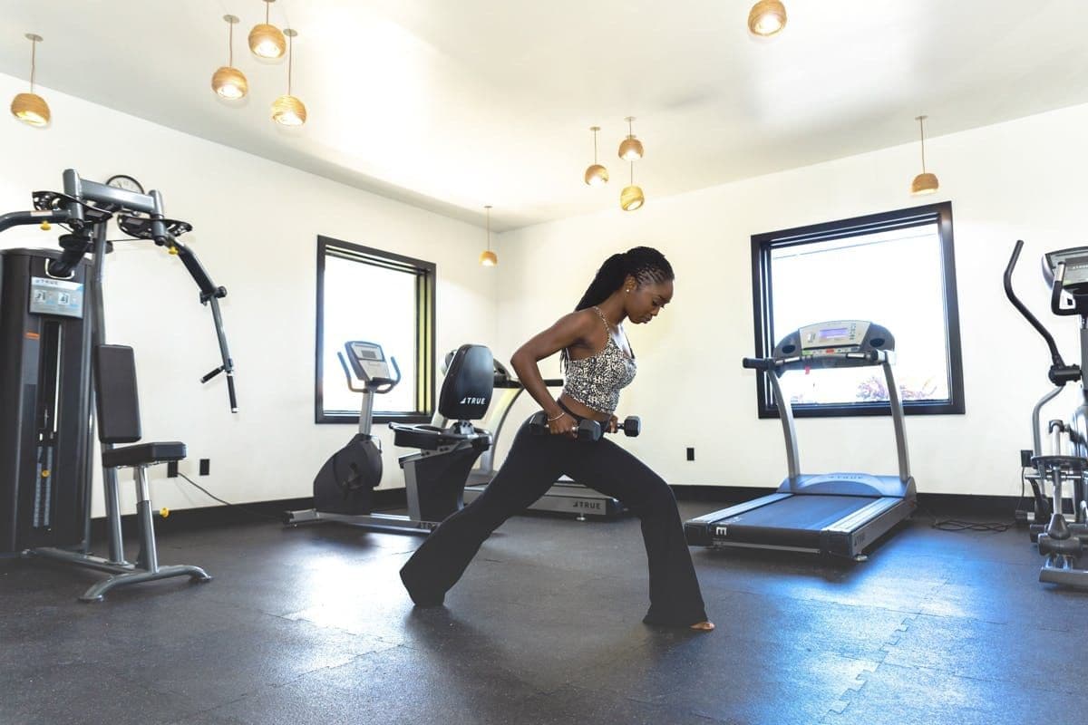 Resort gym with cardio and weights equipment at Life in the Palm, Antigua
