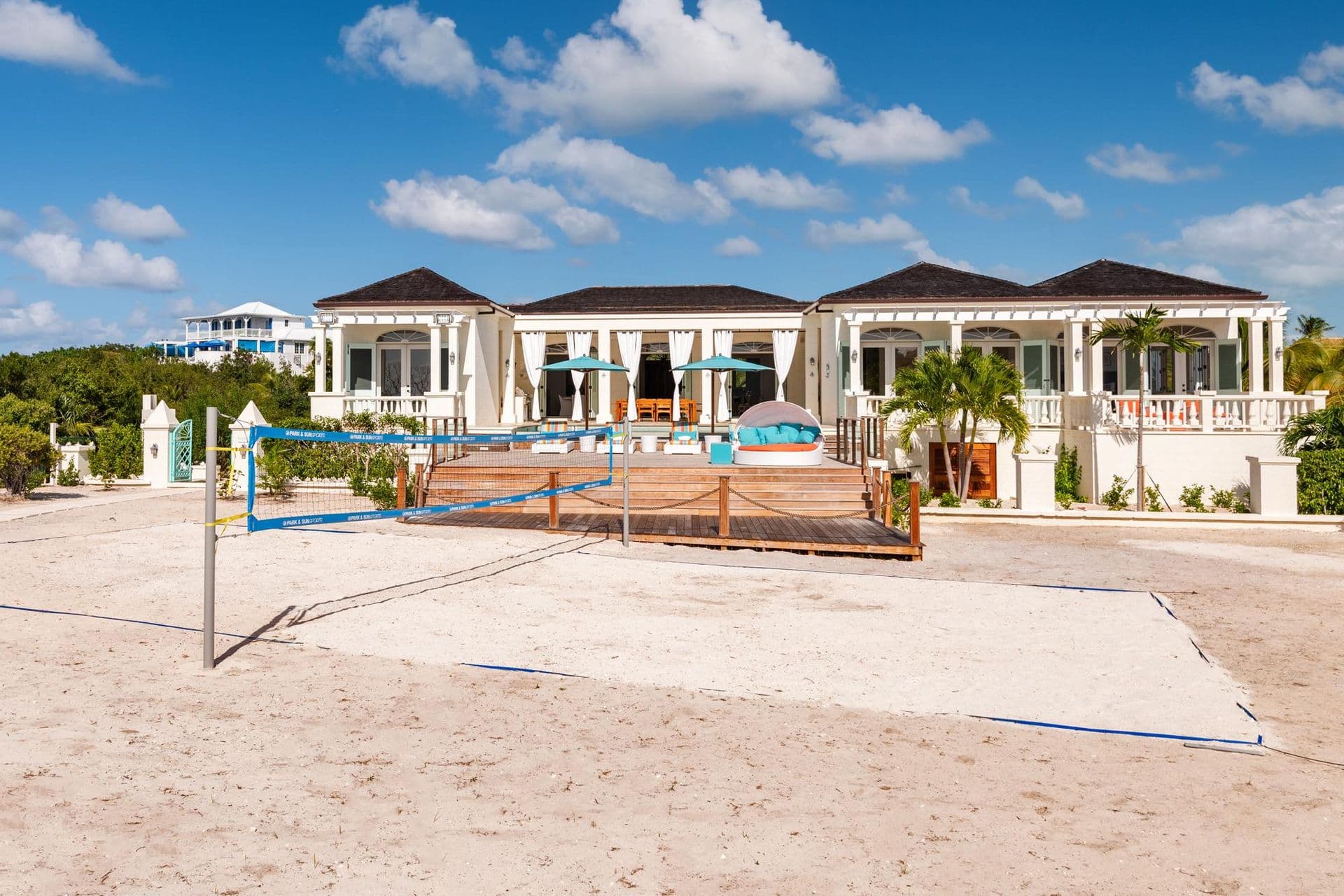 Aerial view of The Fairytale of Turks & Caicos showing the villa, pool and beach volleyball court