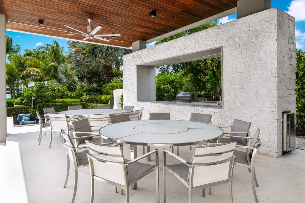 Outdoor dining and kitchen with a stone servery at Villa Awa