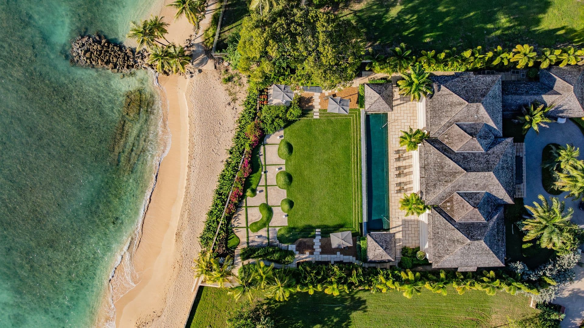 Overhead view of the beachfront villa, pool and lawn on the Platinum Coast at Moonlight Beauty, Barbados
