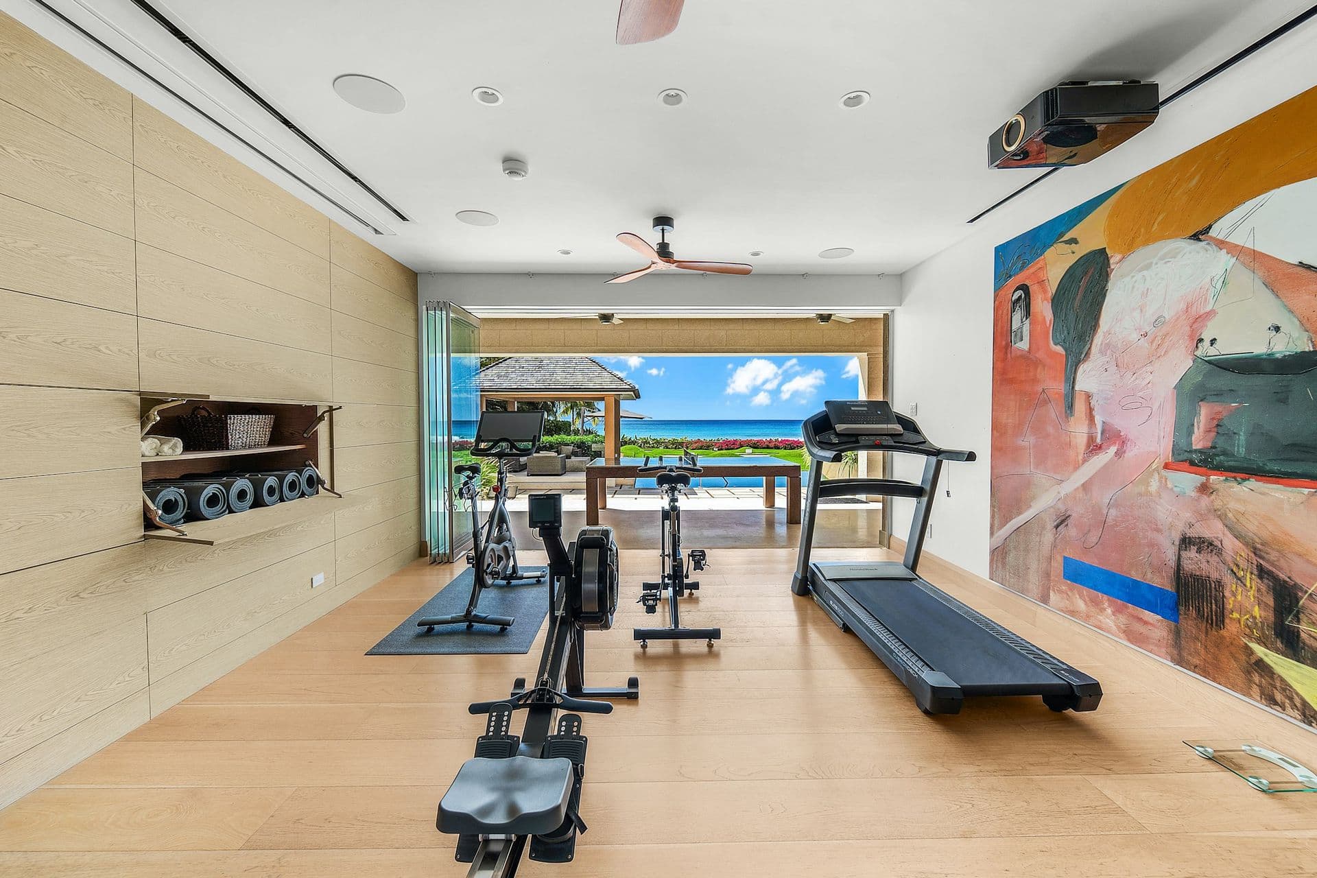 Home gym opening to the garden and sea at Moonlight Beauty, Barbados