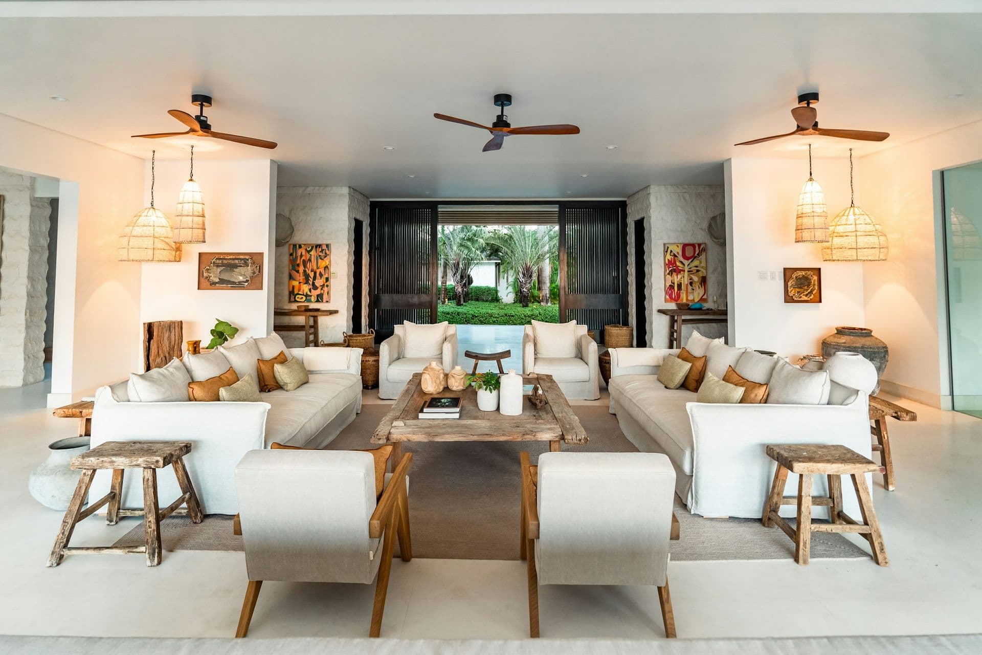 Grand living room with contemporary art and white sofas at Moonlight Beauty, Barbados
