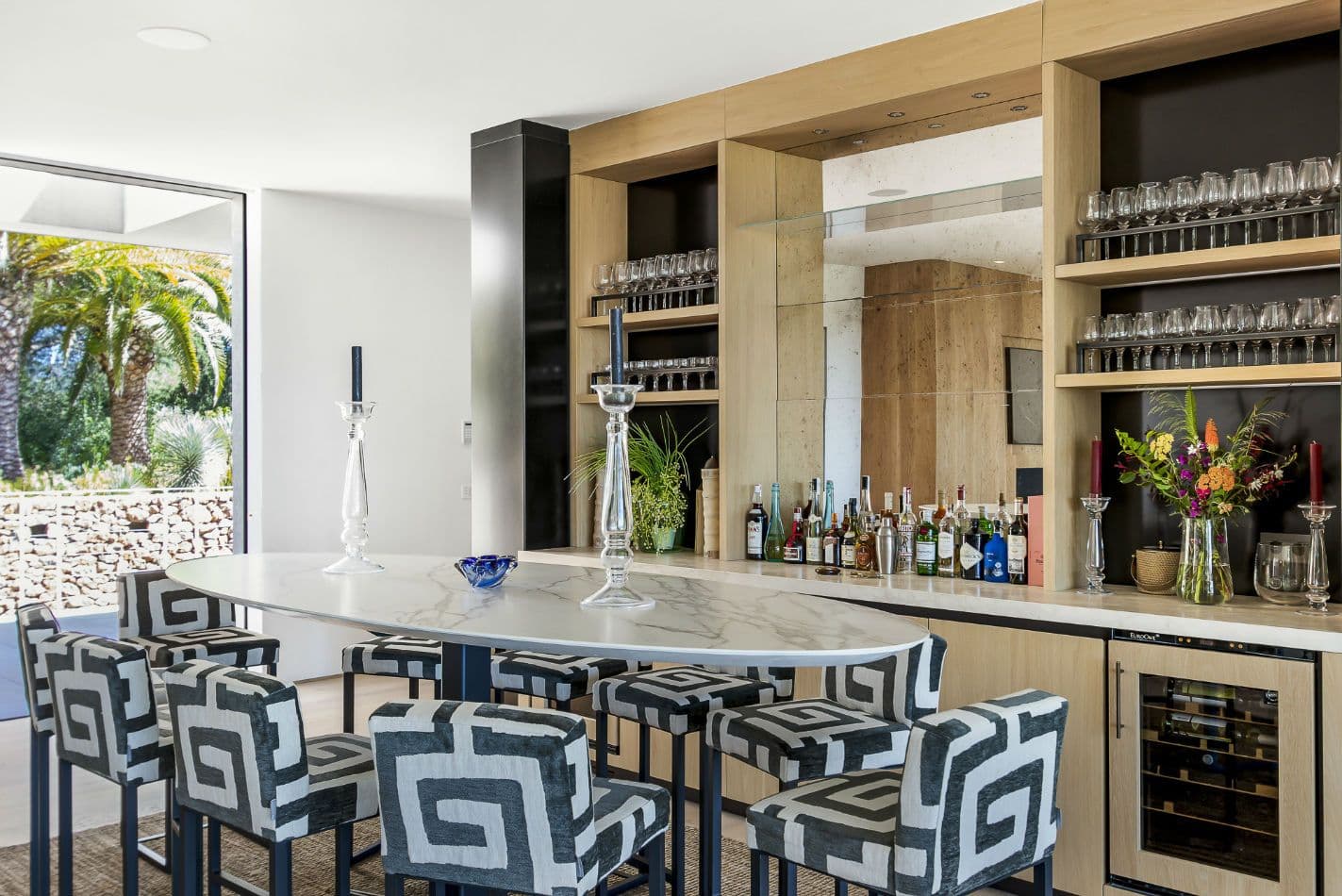 Marble breakfast bar with patterned stools beside the drinks bar at Aphrodite's Oasis, Ibiza
