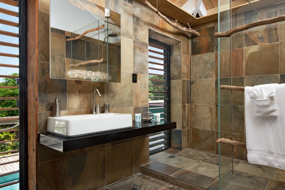 Guest en-suite with a slate-tiled walk-in shower at Silver Sands