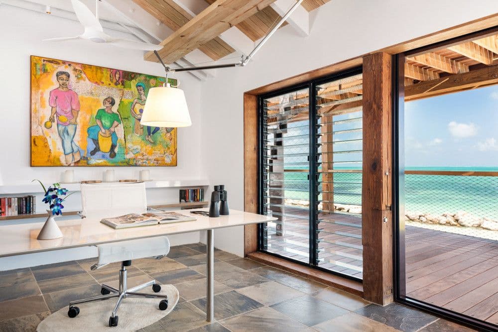 Study with a desk and ocean-view doors at Silver Sands