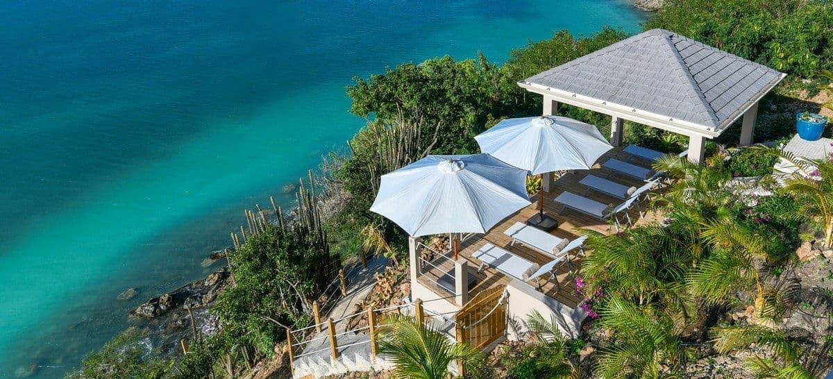 Waterside gazebo and sun deck on the shoreline below Sea Breeze Cove