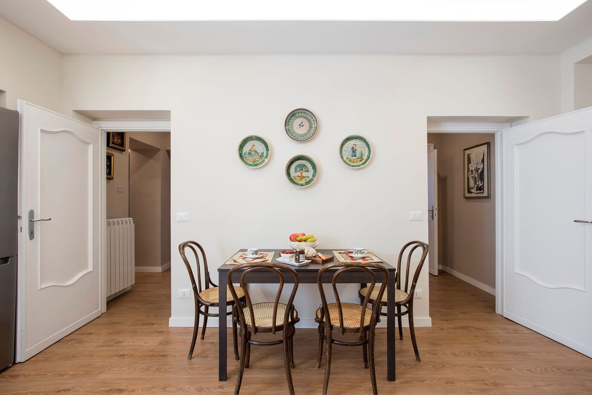 Dining room with wooden table set for six