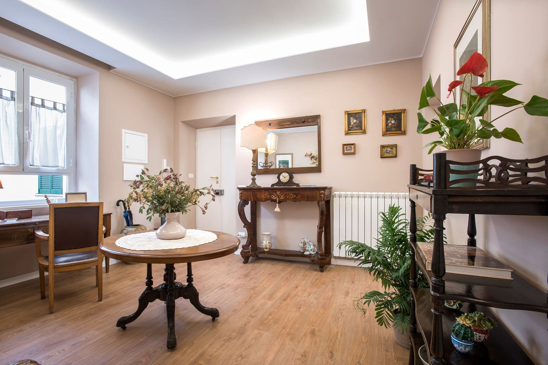 Hallway with console table and decorative plates