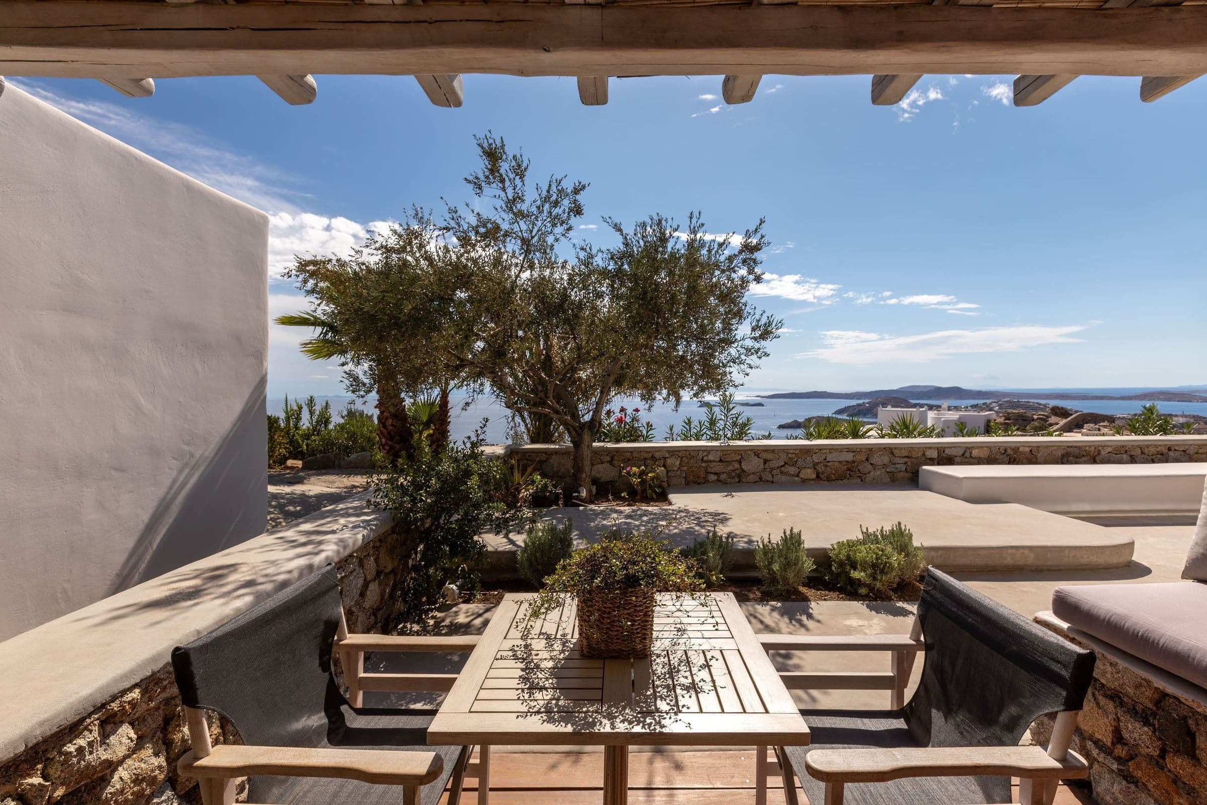 Villa Infinite Breeze outdoor dining terrace with pergola, Mykonos, Greece