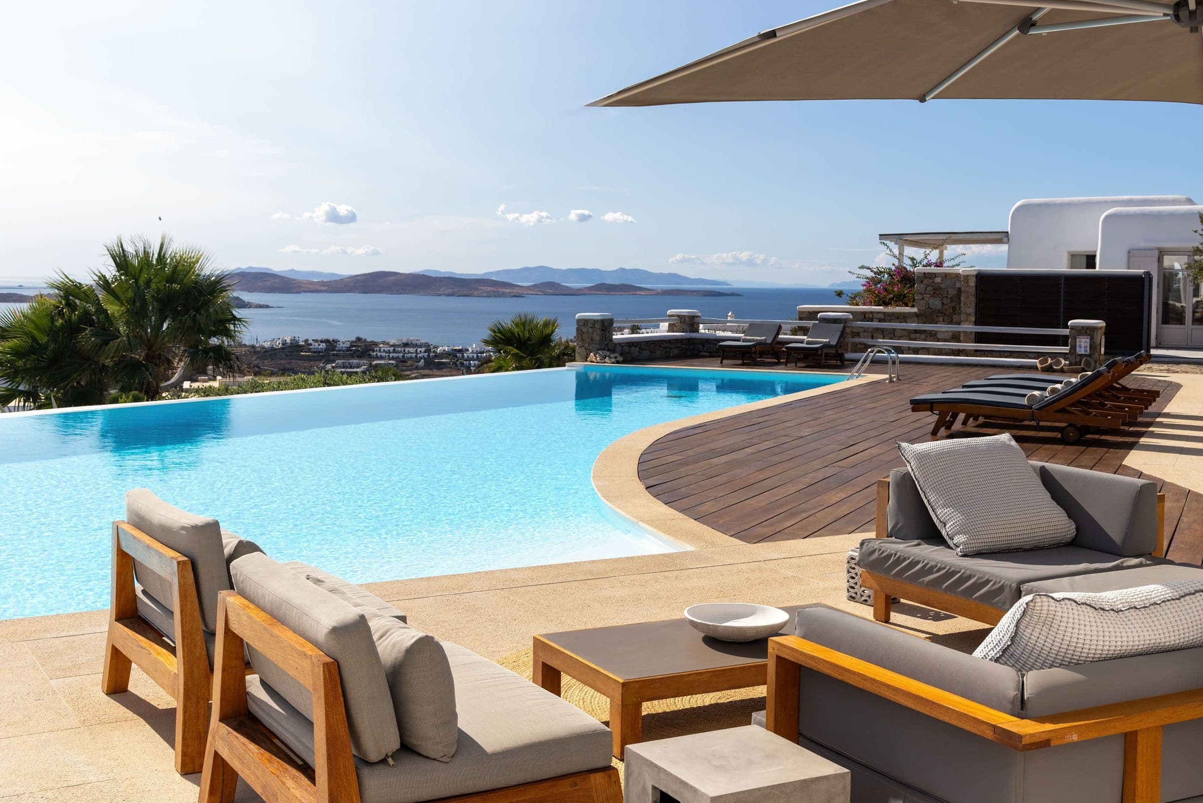 Villa Infinite Breeze outdoor terrace lounge overlooking pool and sea, Mykonos, Greece