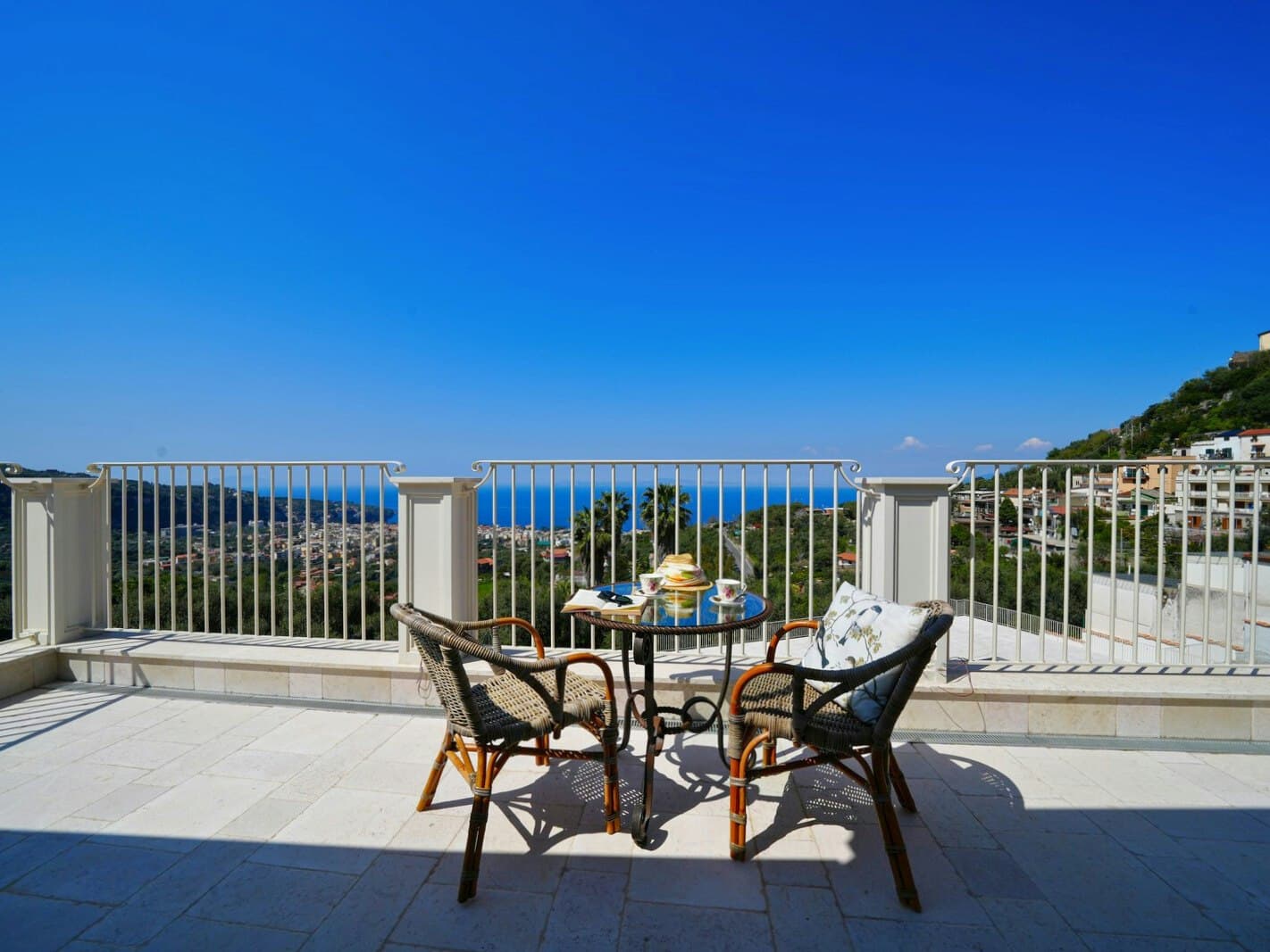 Casarlano Sunsets rooftop terrace with dining area overlooking Bay of Naples, Sorrento, Italy