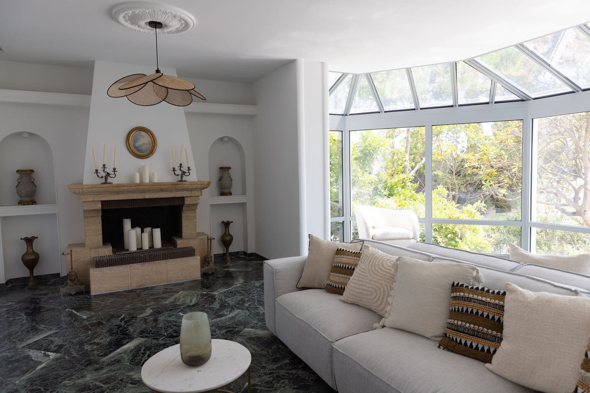 Glazed conservatory with marble floors opening to the pool garden at Cote D'Azur Sunshine, Antibes