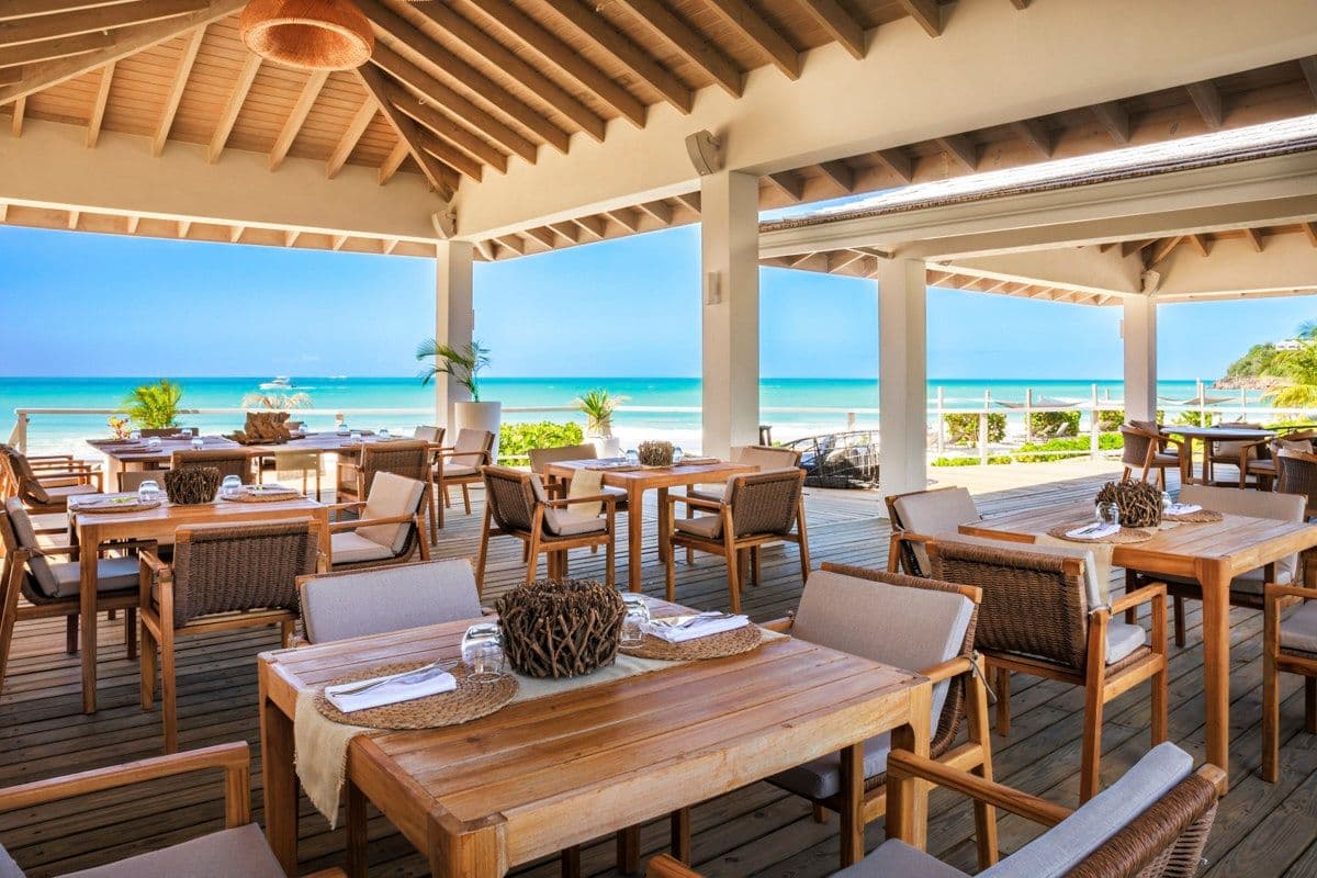 Open-sided resort restaurant over the beach at Views in the Tropics, Antigua