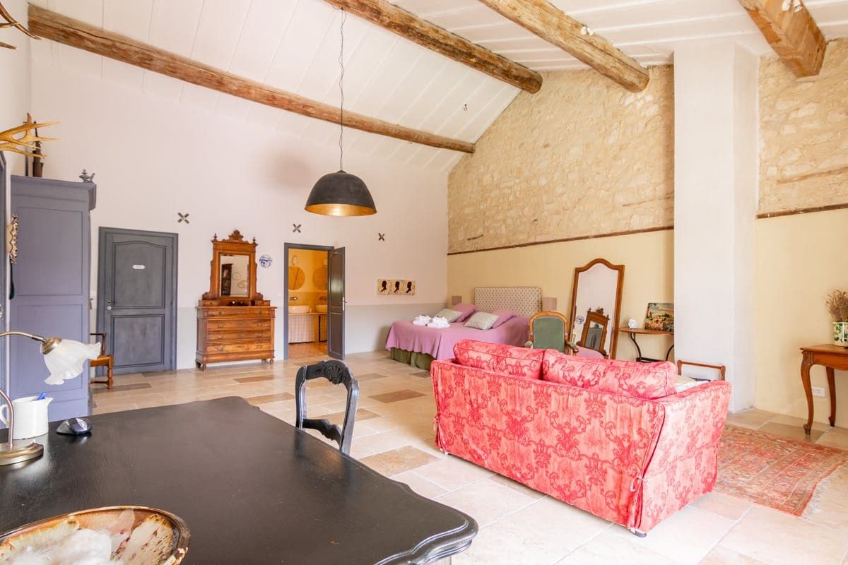 Vaulted open-plan living space with exposed beams