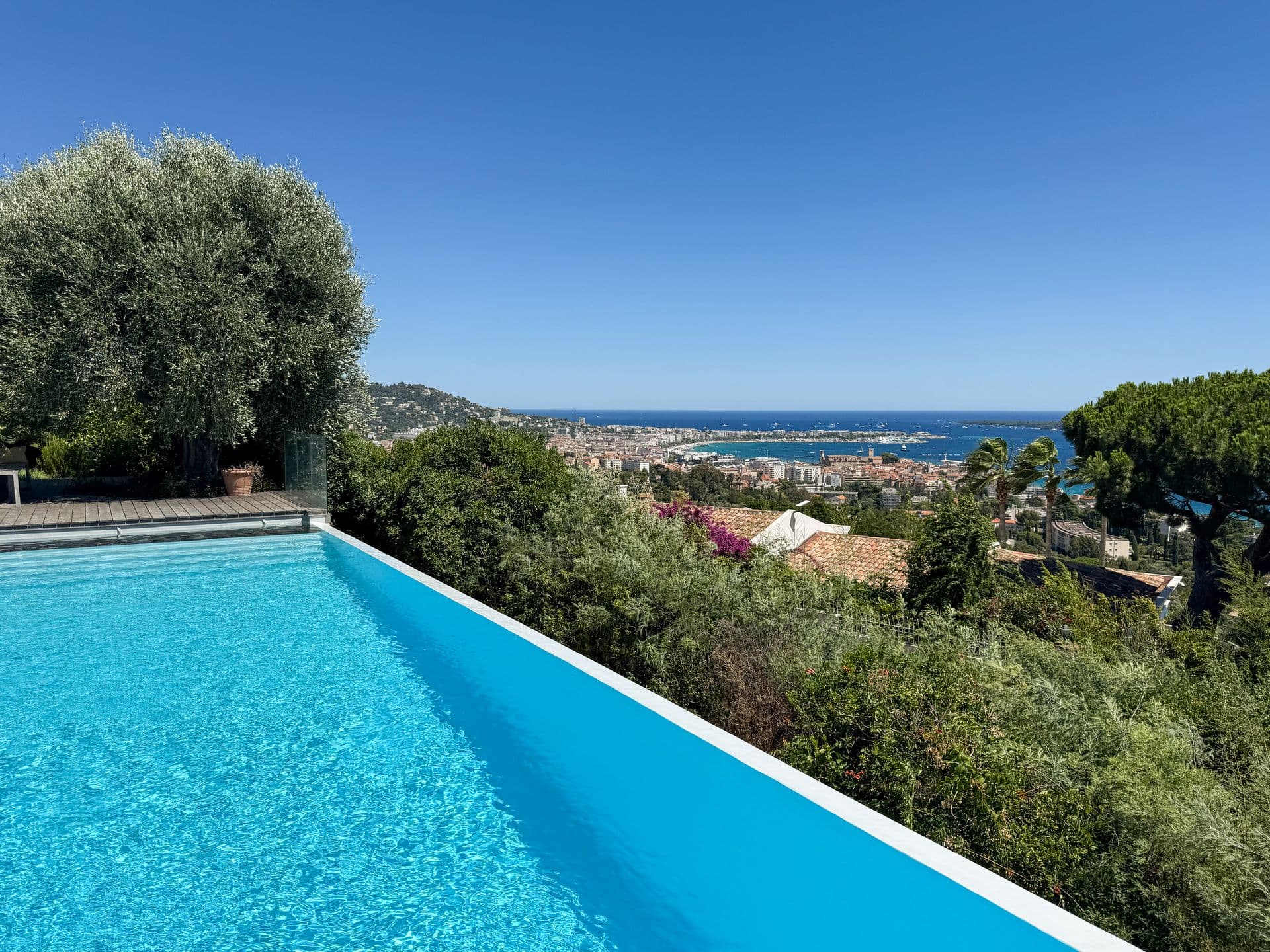 Infinity pool above a panoramic view of the Bay of Cannes at An Azure Vision, French Riviera