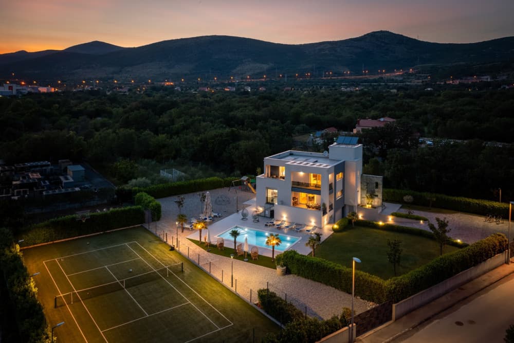 Split 21 aerial view with tennis court, pool and Croatian mountains, Split, Dalmatian Coast