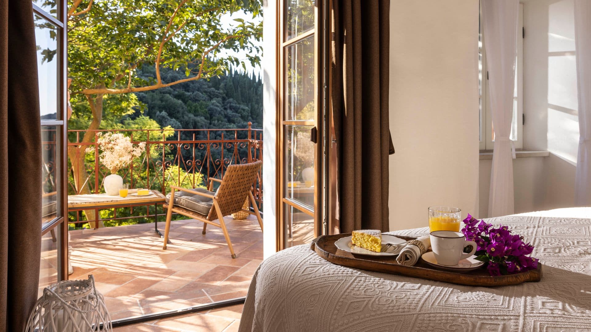 Double bedroom opening to a balcony over the garden at Aria to the Adriatic, Croatia