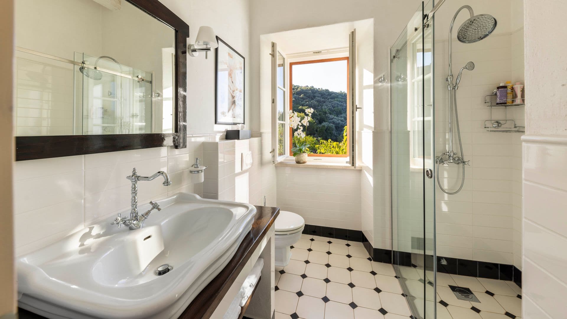 En-suite with a double vanity and glazed walk-in shower at Aria to the Adriatic, Croatia