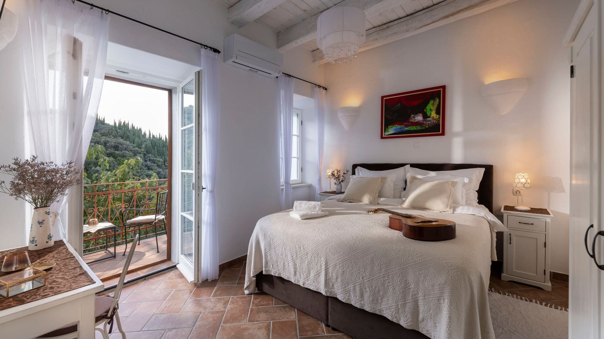 Master bedroom with terrace doors onto the hills at Aria to the Adriatic, Molunat, Croatia