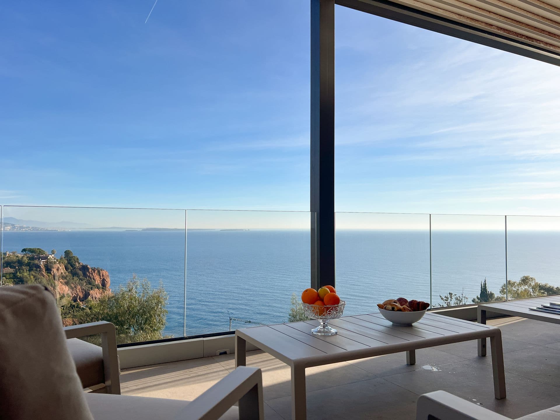 Outdoor dining table on the terrace looking over the Mediterranean