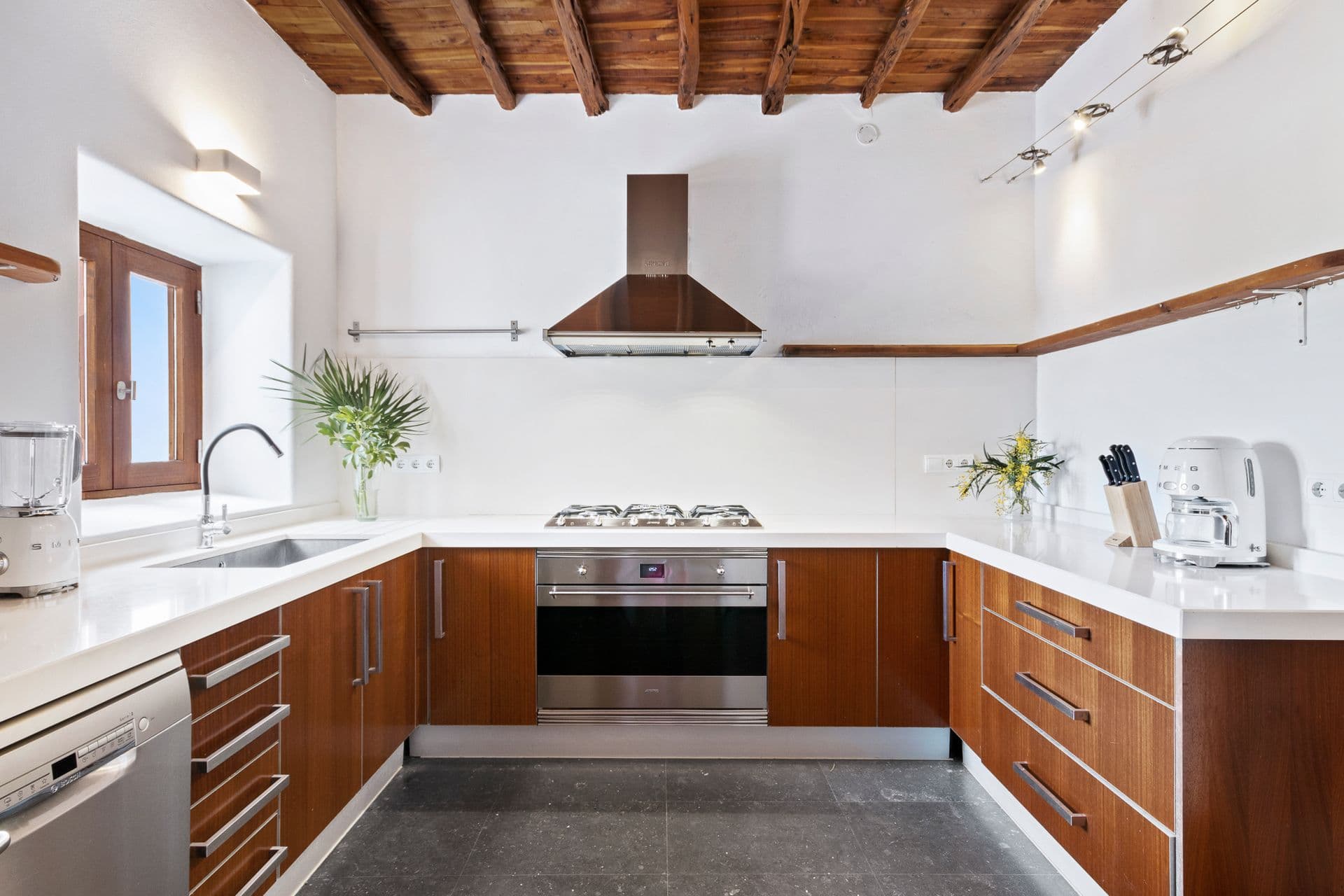 Fitted wooden kitchen at Ode to Balearic Sunsets, Ibiza