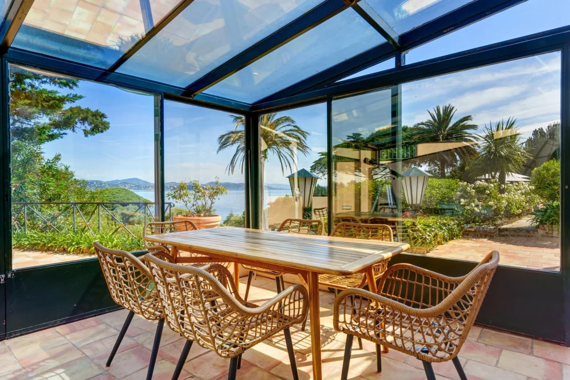 Glass dining pavilion with sea views at South Sea Bliss