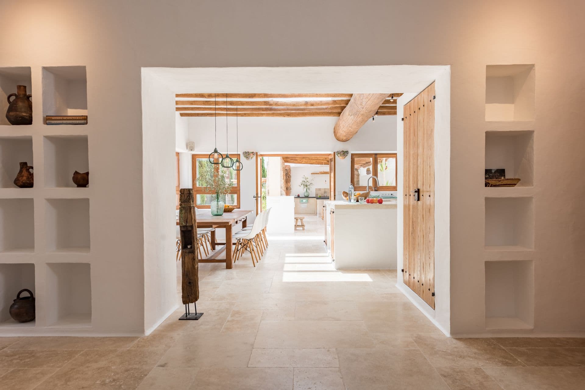 Games room with a pink-felted pool table beneath whitewashed arched walls