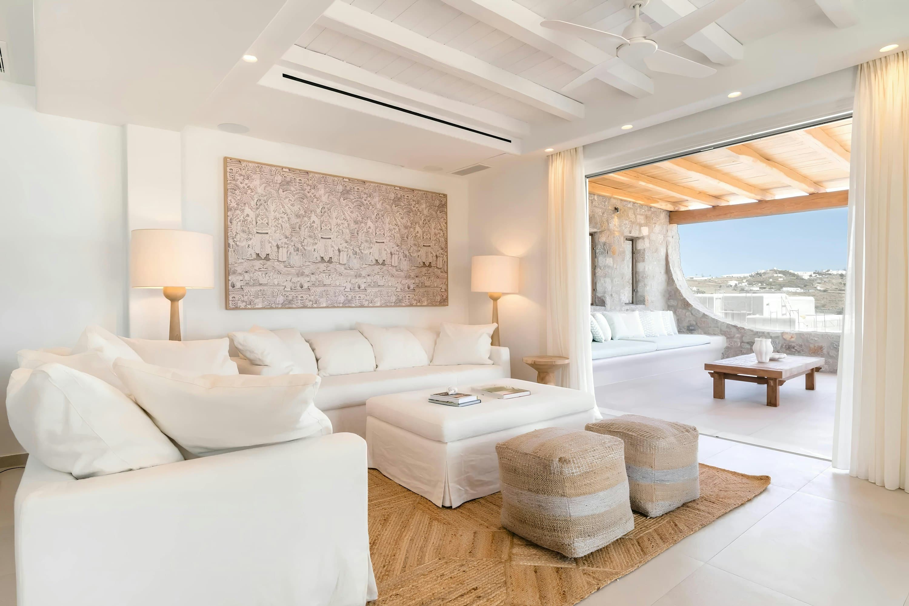 My Aegean Gem all-white living room with sea view terrace access, Ornos, Cyclades Islands, Greece