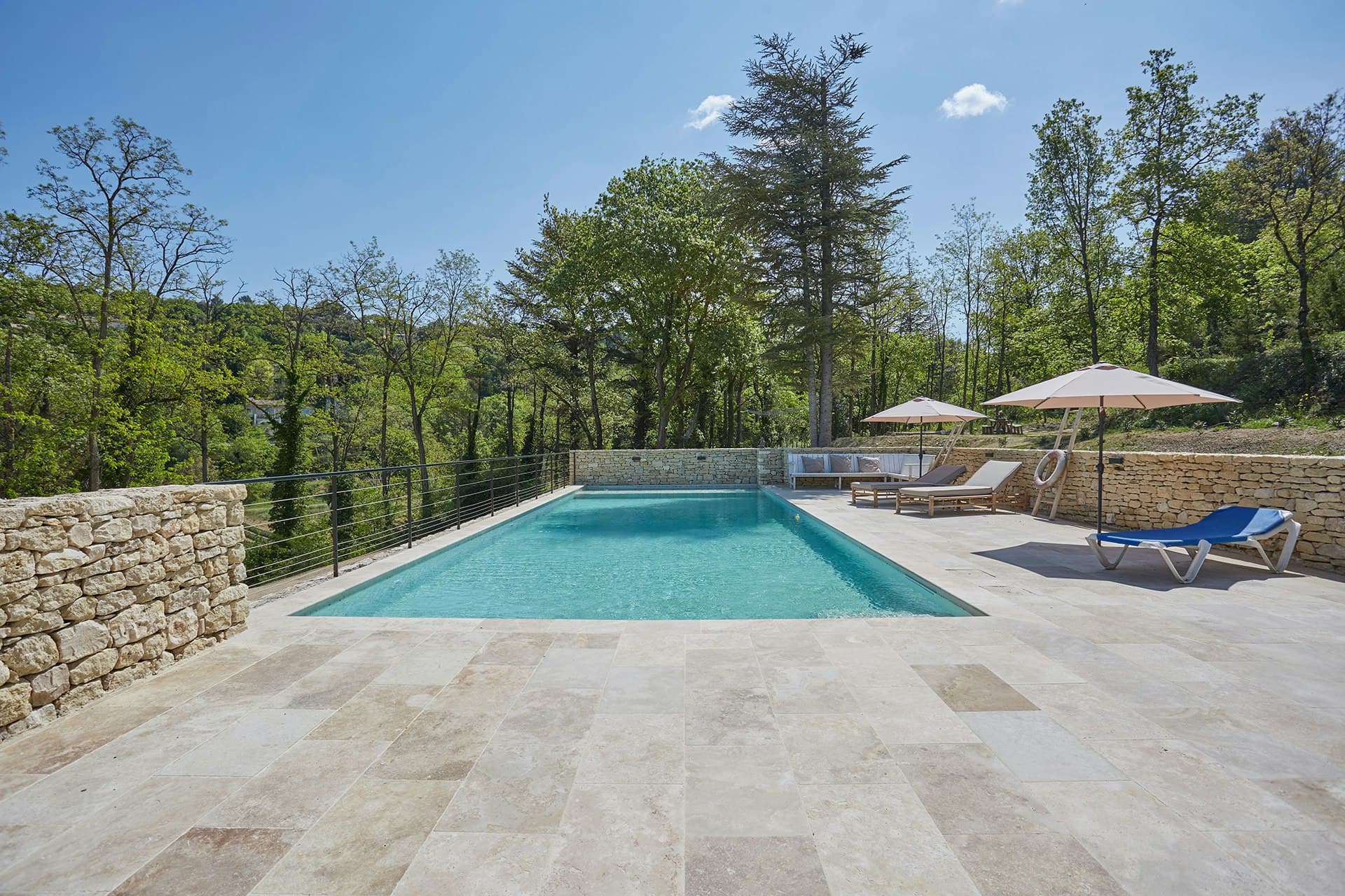 A Glass of Champagne infinity pool with travertine terrace and valley views, Ménerbes, Provence, France