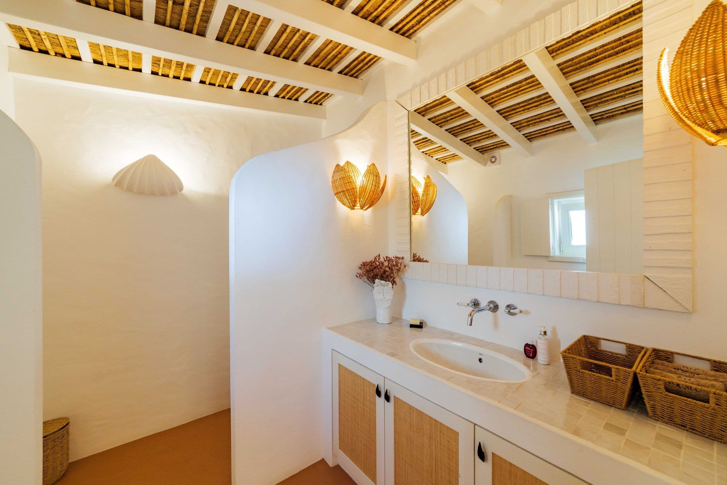 Villa Harmonia da Comporta ensuite bathroom with arched shower and terracotta floors, Comporta, Portugal